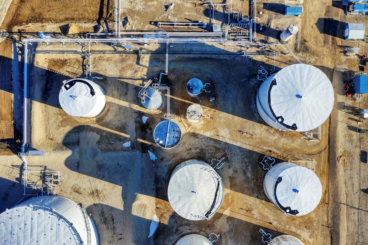 our-story Top-down drone photograph of industrial silos and pipes in Eyota, Minnesota.
